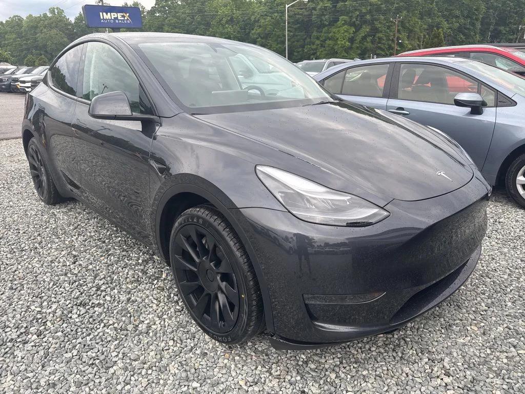 tesla model y 2024 7SAYGDED0RA313646 image